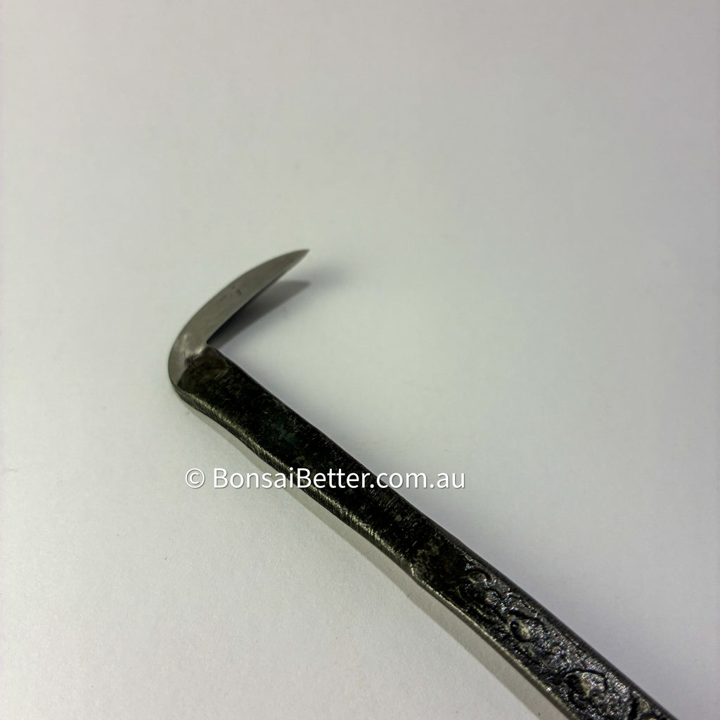 Bonsai tool with a curved blade on a white background