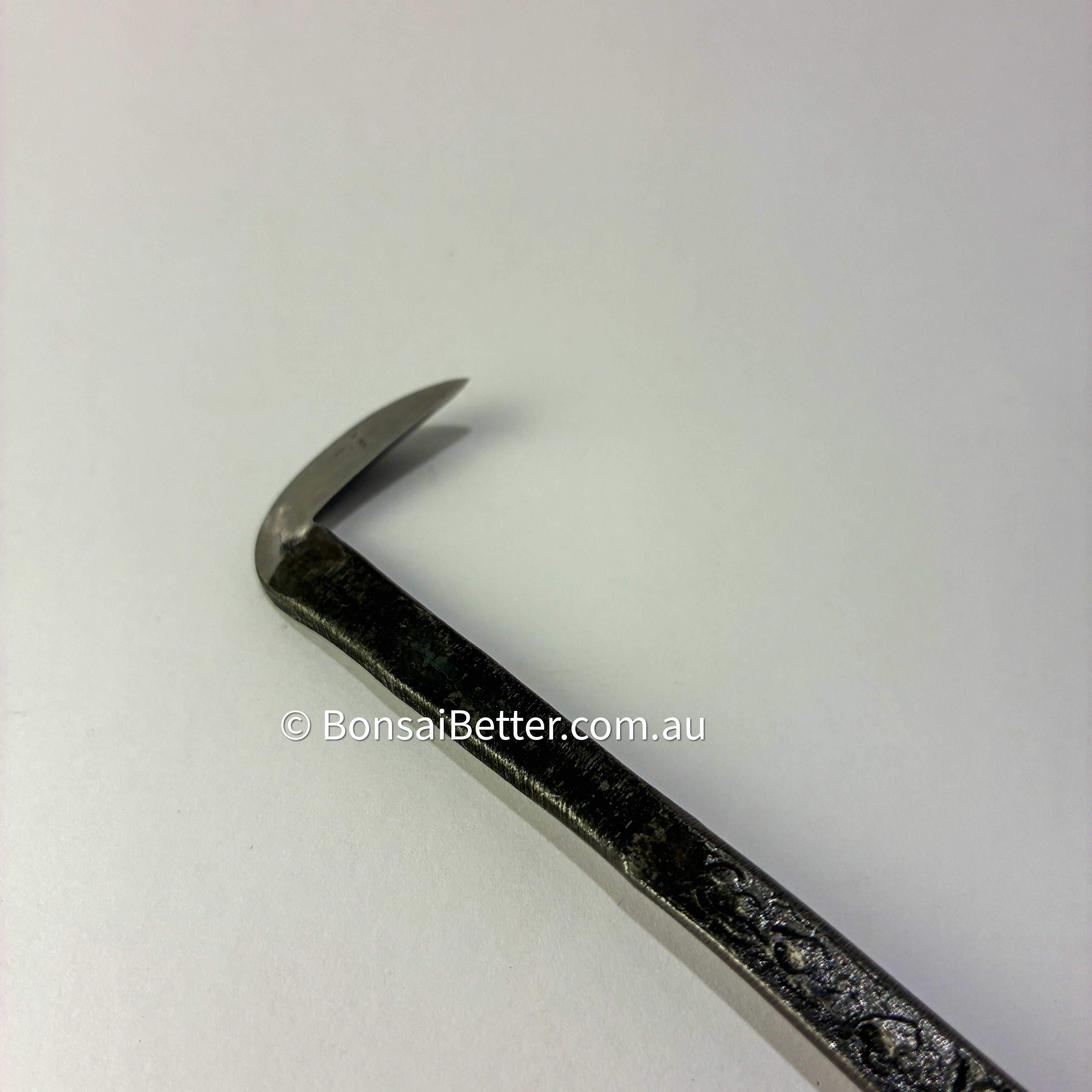 Bonsai tool with a curved blade on a white background